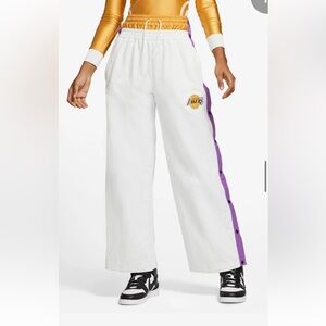 Nike x AMBUSH NBA Collection
Lakers Tearaway Trousers
SIZE SMALL 
NEW WITH TAGS
